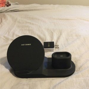 Black 3 in 1 Apple charger.  Phone, watch, iPods